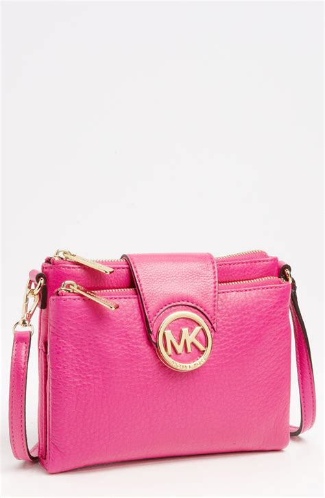 michael kors bag crossbody pink|Michael Kors pink suitcase.